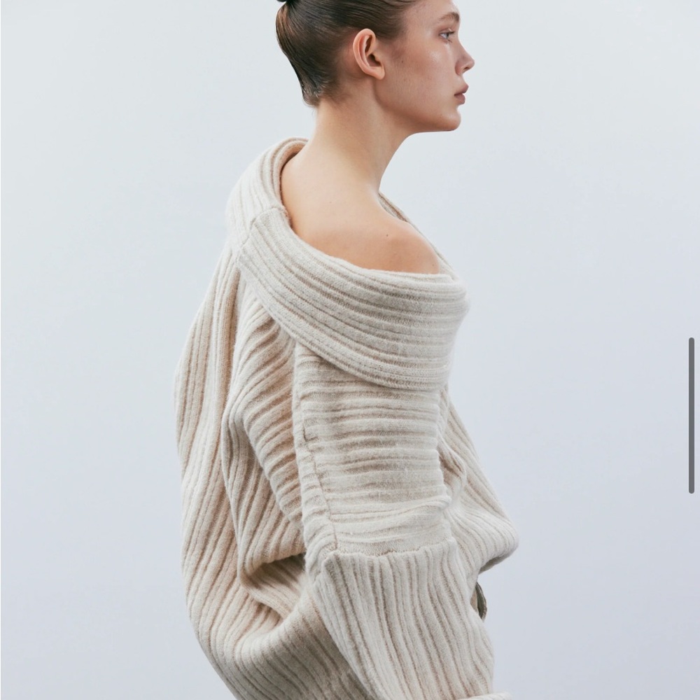 Source unknown an Becca oversized high roll knot pullover